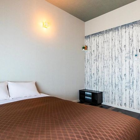 Aparthotel Morimori Land à Ginowan Extérieur photo